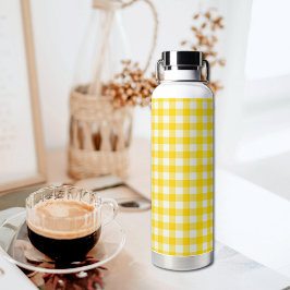 Botella de agua con estampado de cuadros amarillos