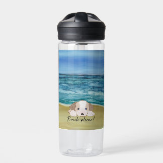 Botella de agua dulce y dulce de la playa