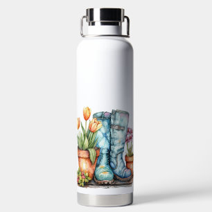 BOTELLA DE AGUA FLORES Y BOOTES DE TIEMPO DE LA PRIMAVERA DEL COLO