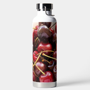 Botella De Agua Fotografía de cerezas rojas frescas en un tazón