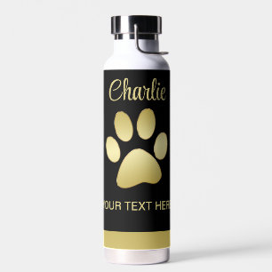 Botella De Agua Paw dorada de perro brillante sobre fondo negro