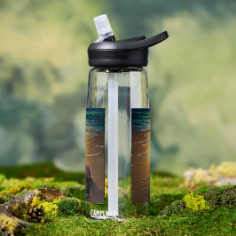 Botella De Agua Playa al atardecer con conchas