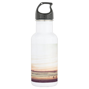 Botella De Agua Puesta del sol en la playa del océano, California