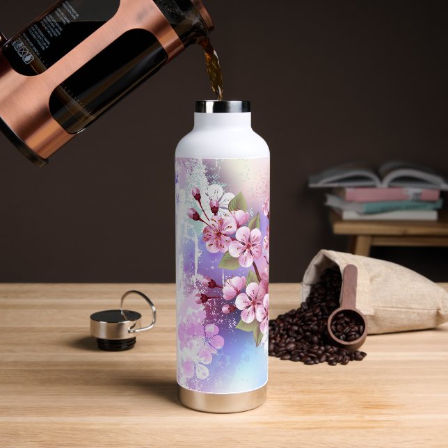 Botella De Agua Sakura rosa sobre fondo de pintura (Café)