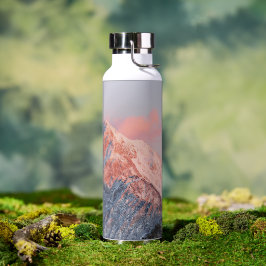 Botella De Agua Última luz solar en la montaña Storžič, Eslovenia