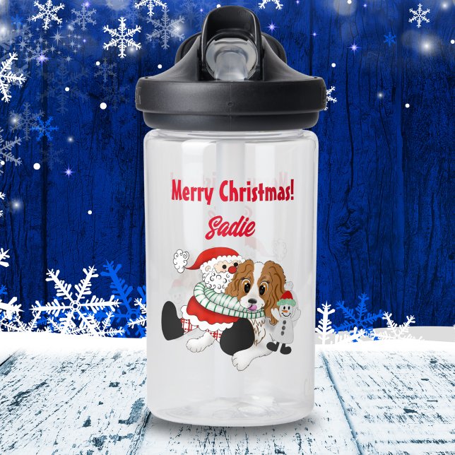 Botella De Agua Un Rey Charles Navidades muy Cavalier (Personalized Christmas water bottle: Santa hugging a Cavalier King Charles Spaniel. Kid-approved!)