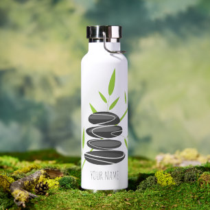 Botella de agua Zen con piedras de masaje y bambú