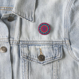 Botón azul con diseño circular