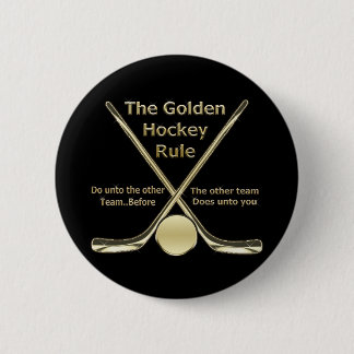 Botón de oro de la regla del hockey