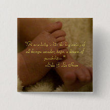 botón de pies de bebé