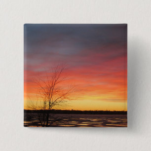 botón de puesta de sol del lago de hielo