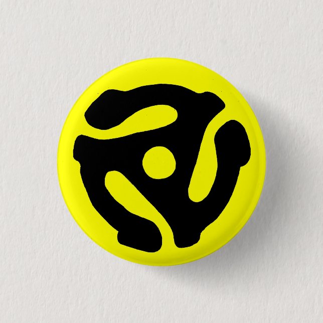 Botón del parte movible del expediente de 45 RPM (Anverso)