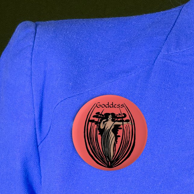 botón Diosa Fantasía (Goddess woman long black hair in abstract black flower pod on round salmon coloured pin back button.)