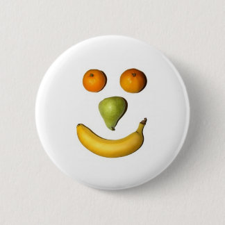 Botón feliz de la cara de la fruta
