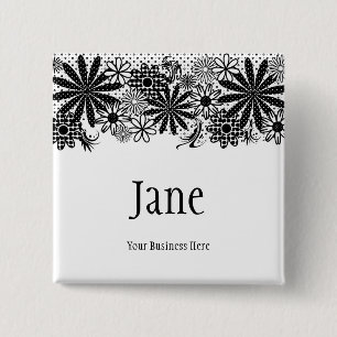 Botón punteado blanco y negro de la insignia