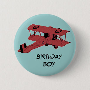 botón rojo del perno del muchacho del cumpleaños