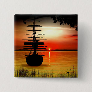 botón Schiff mit Sonnenuntergang