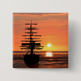 botón Schiff mit Sonnenuntergang