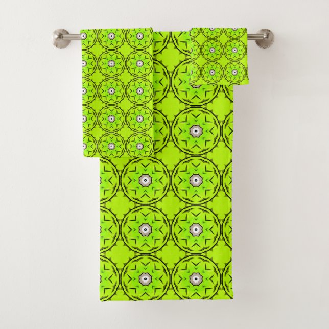 Bright green towel with intricate circular pattern (In situ)