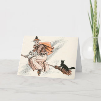 Bruja de época con tarjeta de baño y gato