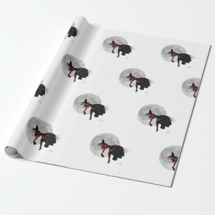 Bruja endeble sobre papel de envolver de escobas v