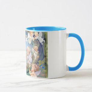 Buenas fiestas la taza del ángel del bebé