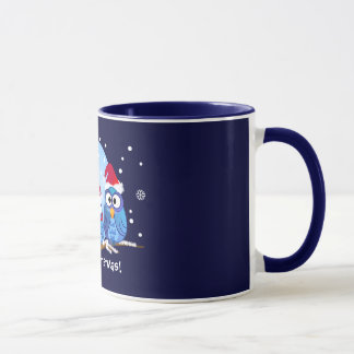 Búhos con la taza de los gorras de Santa