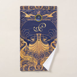 Buque antiguo, delfines, oro, monograma azul marin