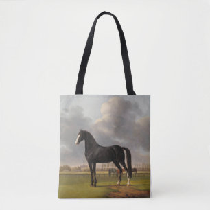 Caballo negro vintage con una bolsa para llevar