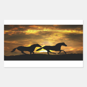 Caballos corriendo en los Pegatinas Sunset