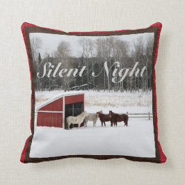 Caballos en almohada de la nieve