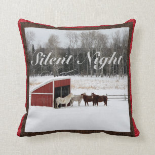 Caballos en almohada de la nieve