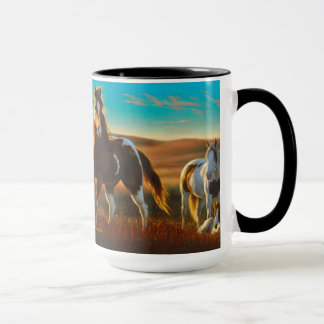 Caballos en taza de la luz del sol