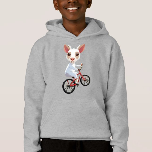 Cabra blanca linda en una bicicleta (Anverso)
