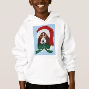 Cachorro Basset Hound con sombrero de Santa
