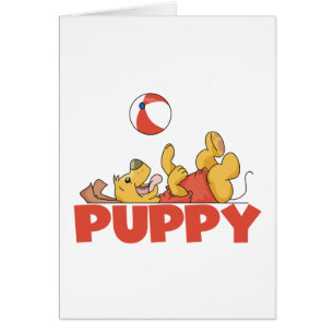 Cachorro juega a las camisetas y a los regalos