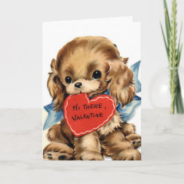 Cachorro lindo con tarjeta El día de San Valentín