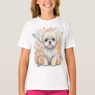 Cachorro maltés con camiseta de flores de verano