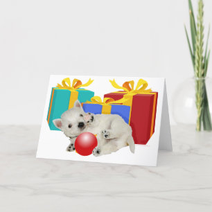 Cachorro Westie con regalos de Navidad