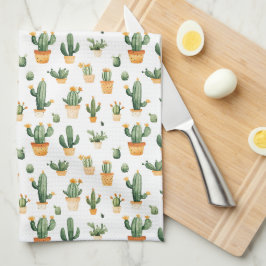 Cactus aferrado a la toalla de cocina blanca
