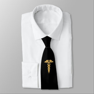 Caduceo dorado médico en corbata negra