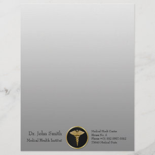 Caduceo médico del oro - papel con membrete