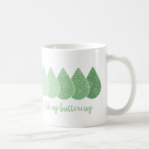 Café Aceite encima de la taza del ranúnculo (verde)