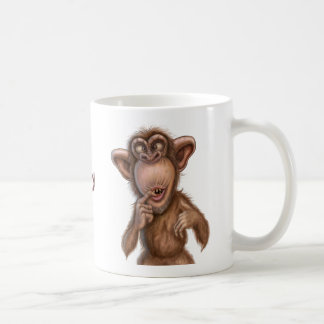 Café Bebida encima de la taza del mono