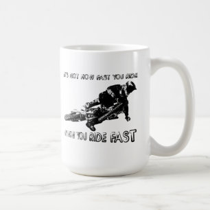 Café Cómo usted monta la taza rápida del motocrós de