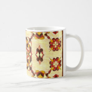 Café diseño 3 de la manta en una taza