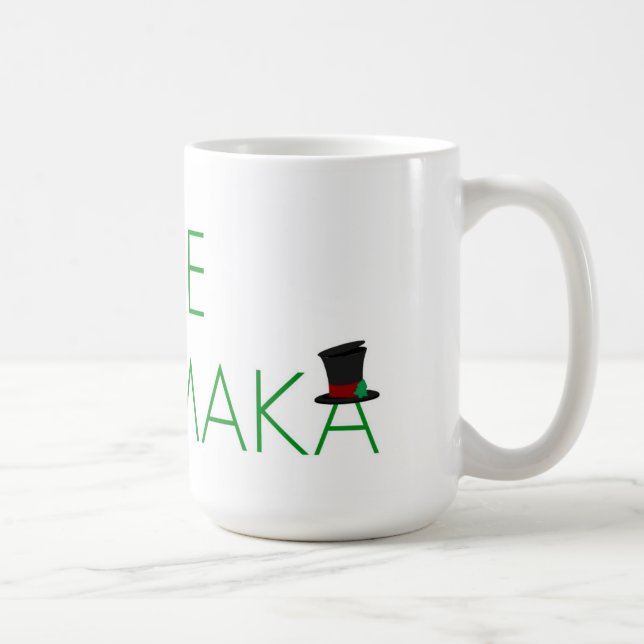 CAFÉ FELICES NAVIDAD DE "MELE KALIKIMAKA" EN TAZA (Derecha)