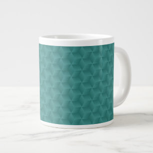 Café Gigante Una taza de té verde presenta un patrón geométrico