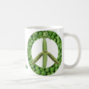 Café Guisantes en la taza de la tierra