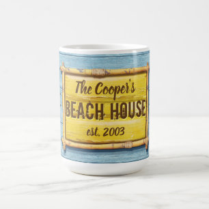 Café La familia Driftwood Beach House firma una taza de